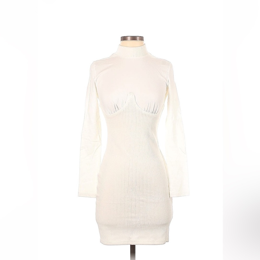 Fitted Cocktail Dress with long sleeves.